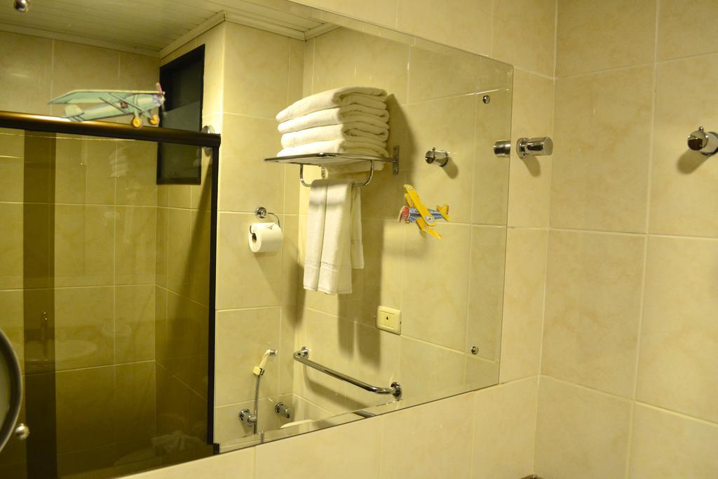 Quarto Quádruplo com Varanda
